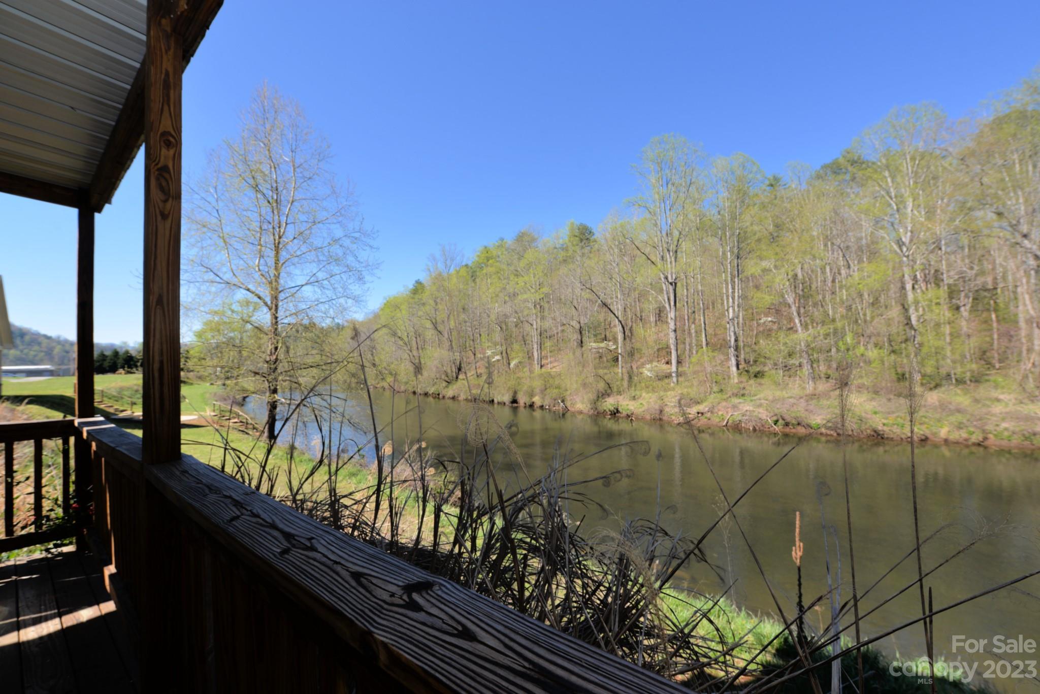 99 Bayside Drive Sylva, NC 28779 - Photo 34 of 34 a view of a balcony with wooden fence and floor