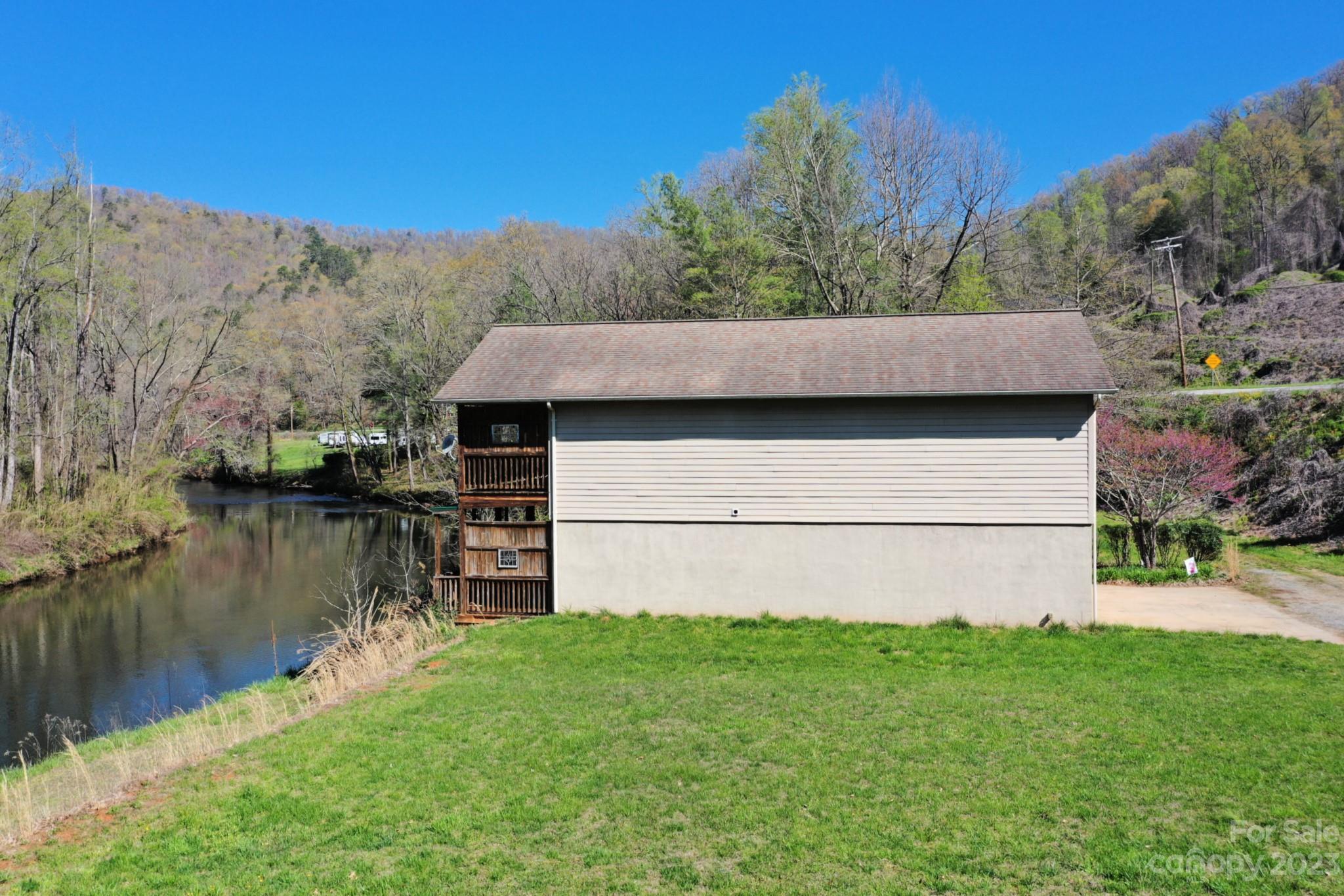 99 Bayside Drive Sylva, NC 28779 - Photo 5 of 34 a view of house with a lake view