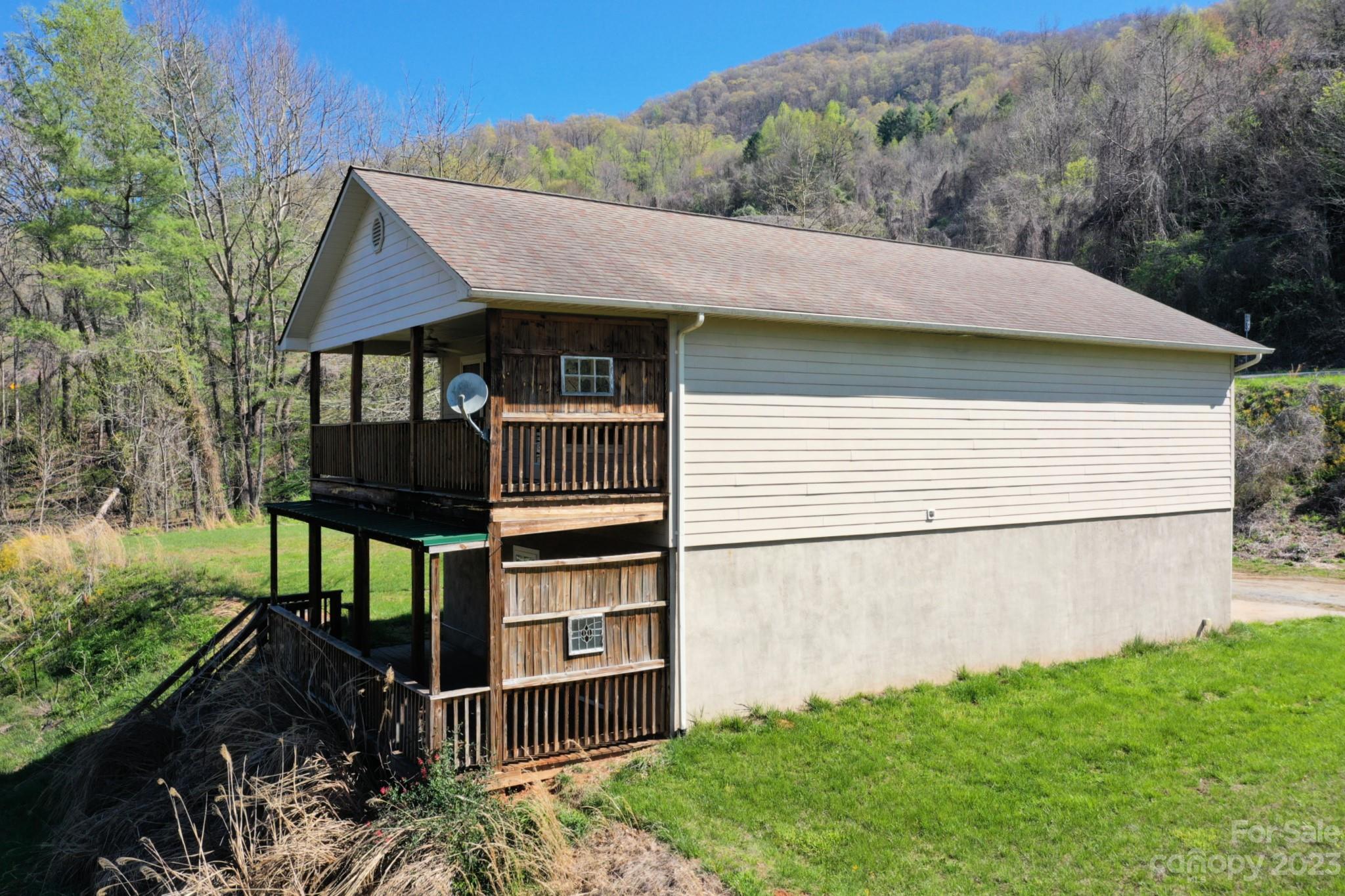 99 Bayside Drive Sylva, NC 28779 - Photo 9 of 34 a view of a house with backyard