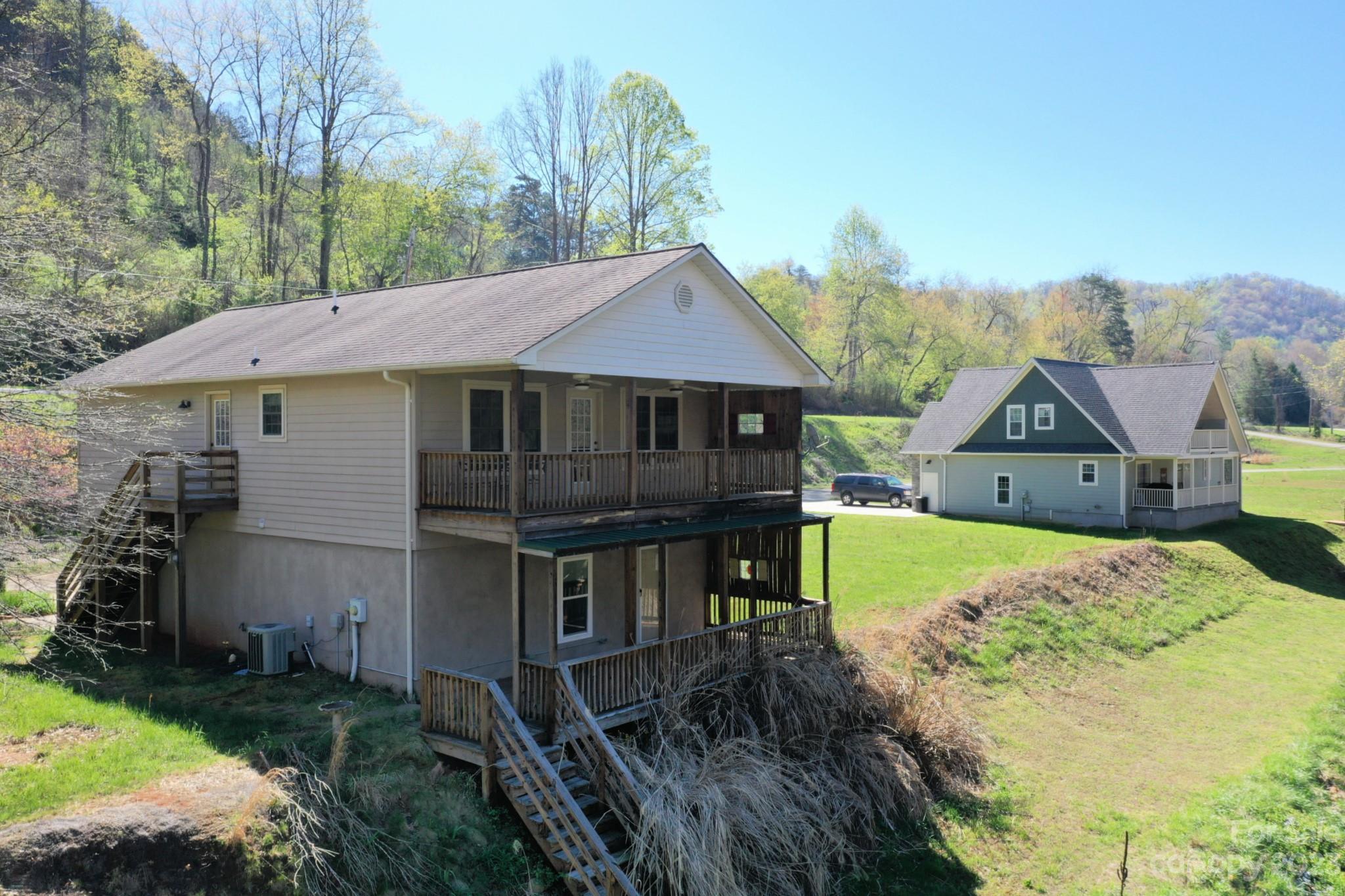 99 Bayside Drive Sylva, NC 28779 - Photo 10 of 34 a house view with a garden space