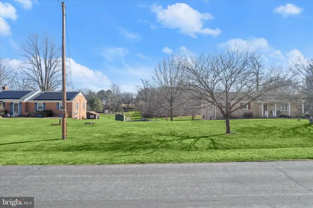 a view of a house with a big yard