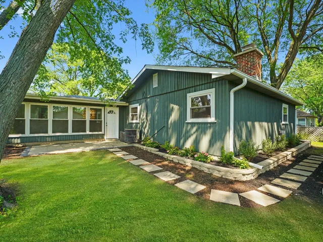 a view of backyard of a house
