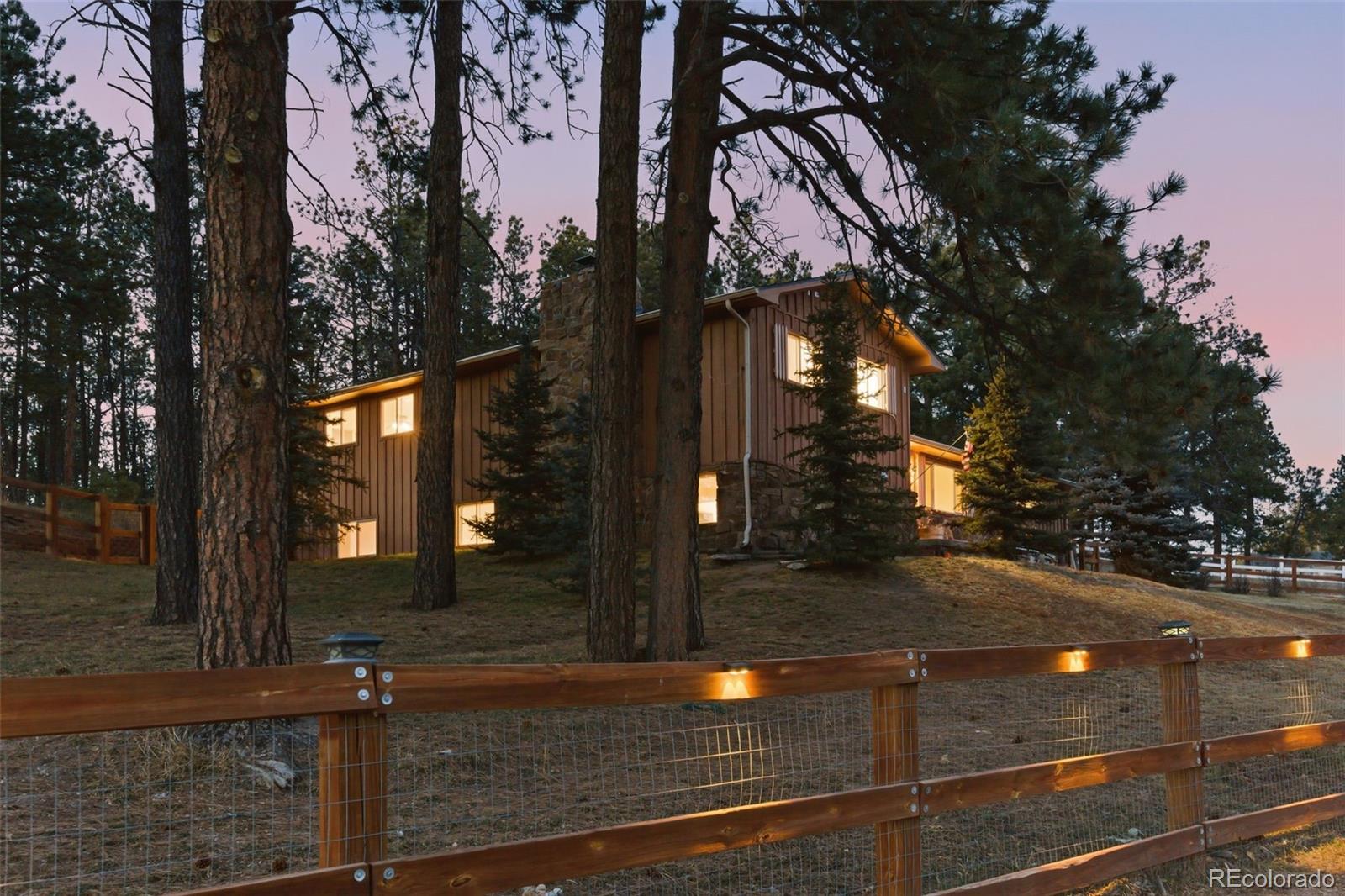 a street sign on a sidewalk next to a road