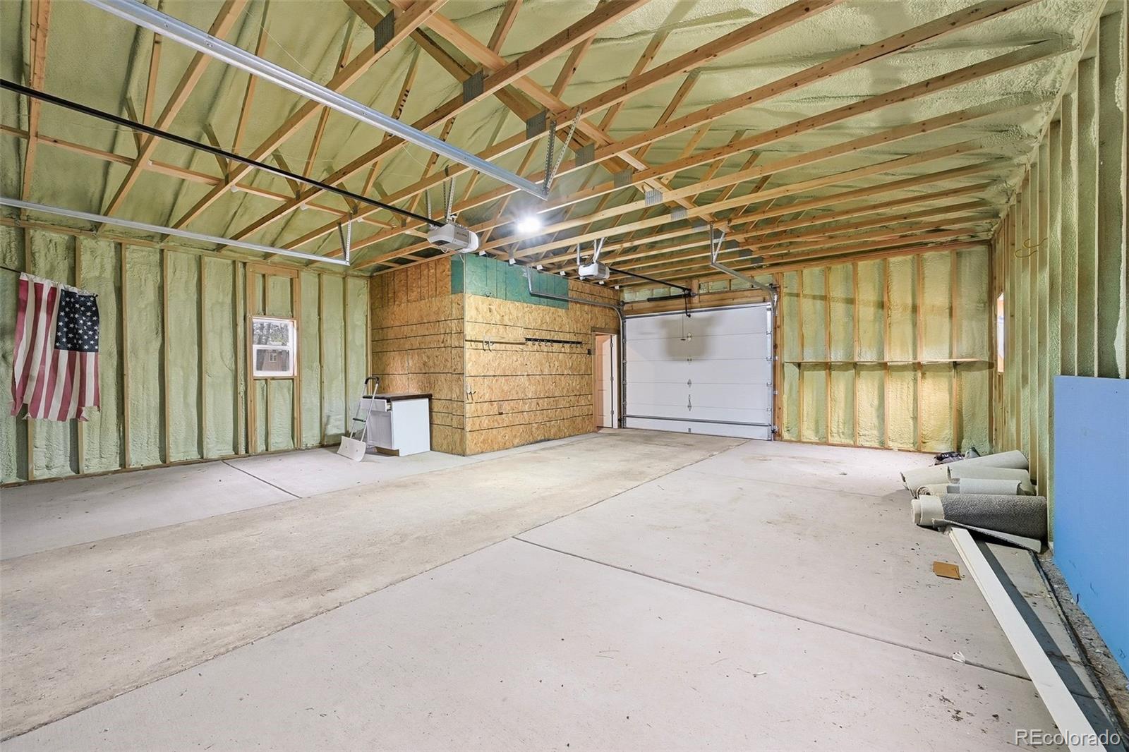 7020 Wildridge Road Colorado Springs, CO 80908 - Photo 38 of 45 a view of a room with wooden walls