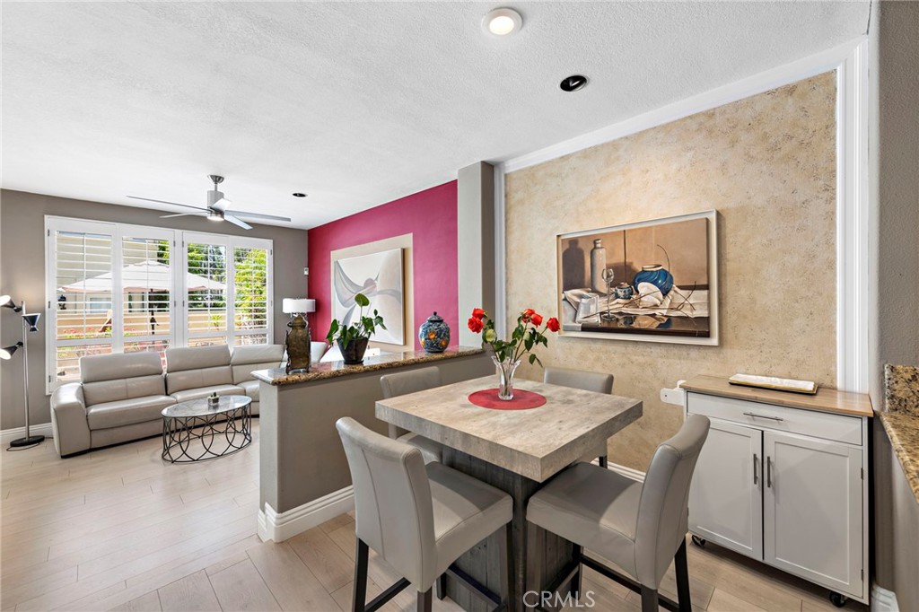 26481 La Scala Laguna Hills, CA 92653 - Photo 16 of 33 a view of a dining room with furniture and a window