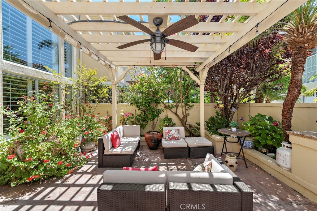 26481 La Scala Laguna Hills, CA 92653 - Photo 22 of 33 a outdoor living space with furniture and garden view