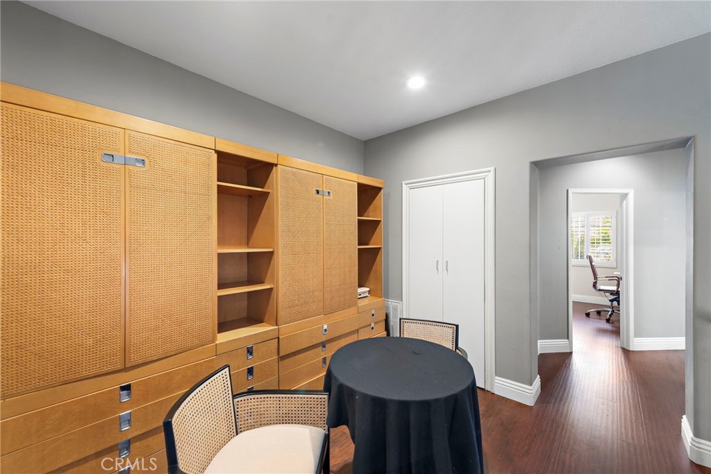 26481 La Scala Laguna Hills, CA 92653 - Photo 29 of 33 a bathroom with a sink mirror vanity and toilet