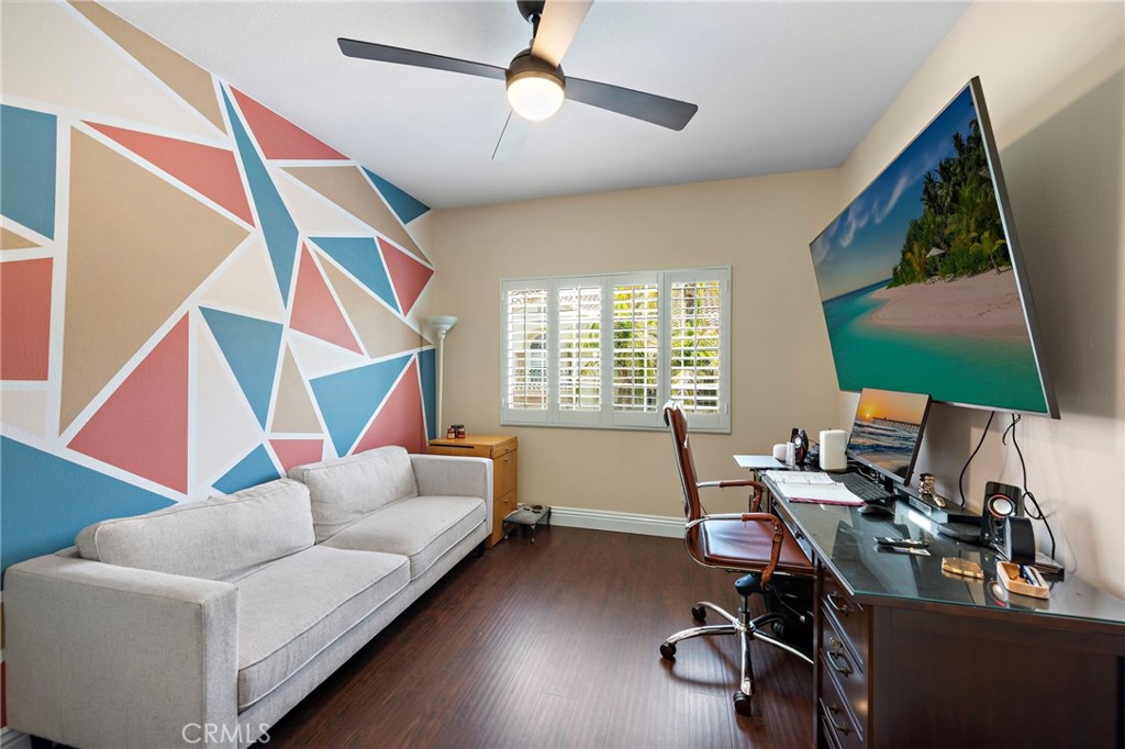26481 La Scala Laguna Hills, CA 92653 - Photo 30 of 33 a living room with furniture and a window