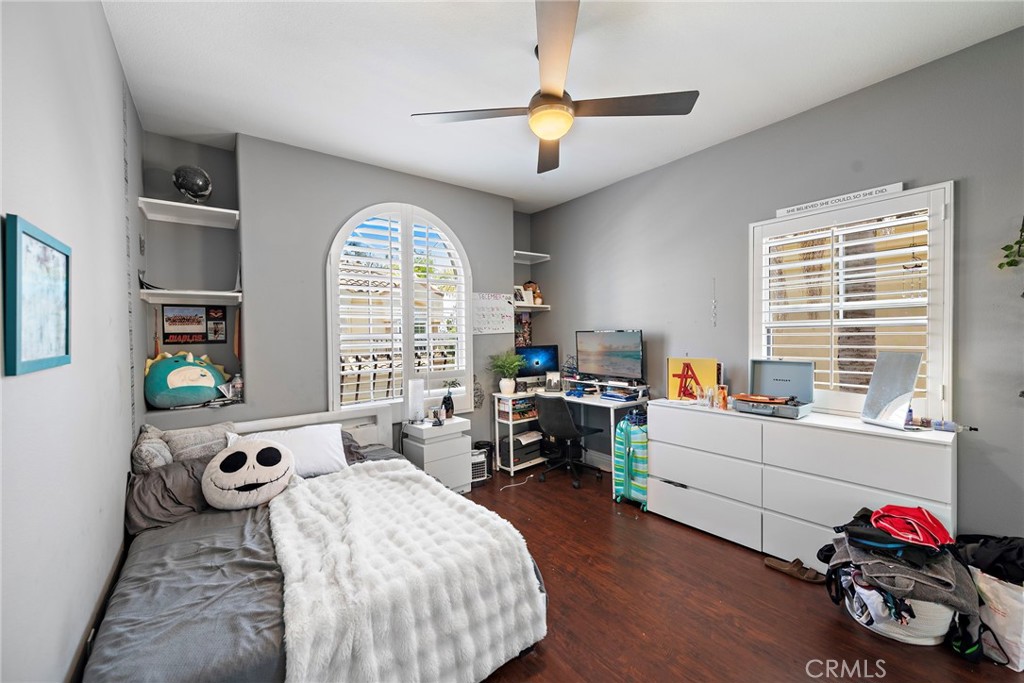 26481 La Scala Laguna Hills, CA 92653 - Photo 31 of 33 a living room with furniture and a large window