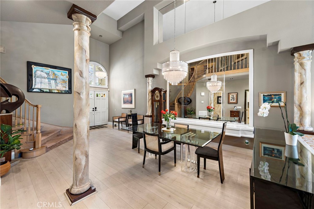 26481 La Scala Laguna Hills, CA 92653 - Photo 8 of 33 a view of a livingroom with furniture and a floor to ceiling window