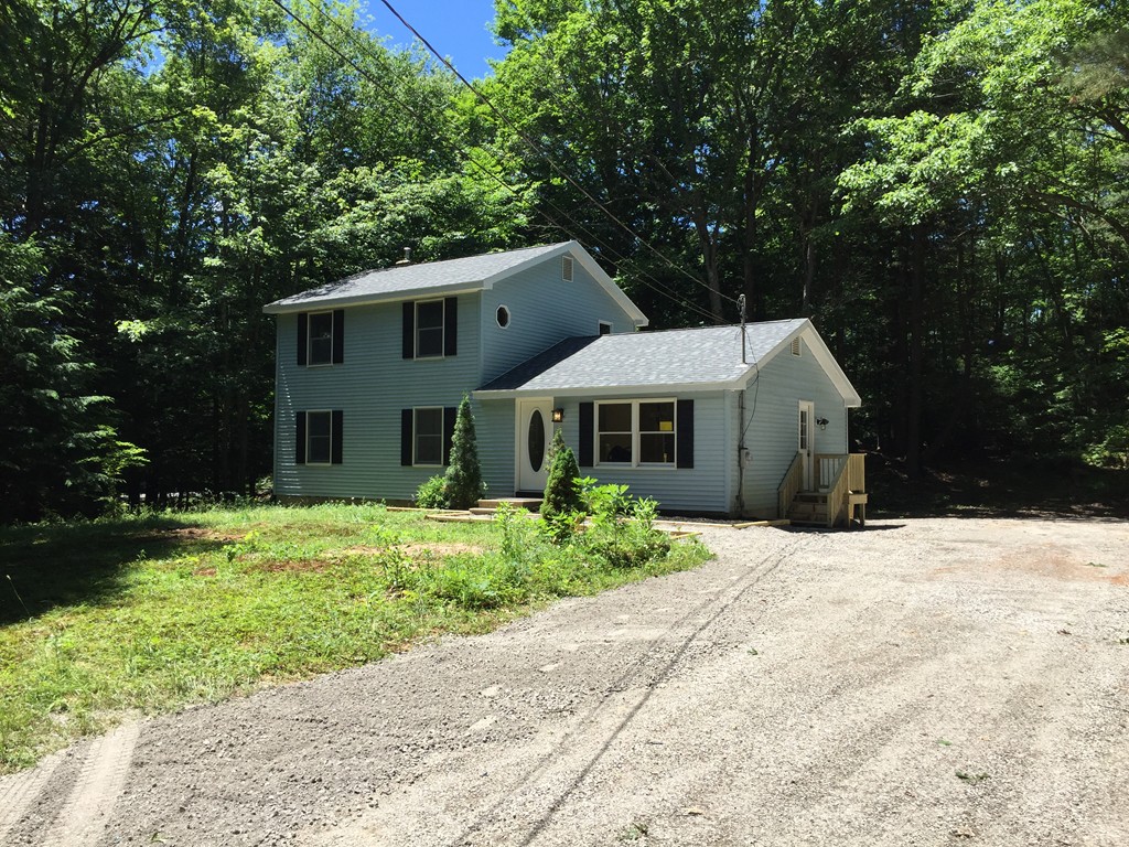 15 Barre Road Templeton, MA 01468 - Photo 1 of 14 a front view of a house with a yard