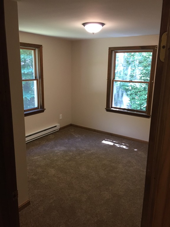 15 Barre Road Templeton, MA 01468 - Photo 11 of 14 an empty room with windows and closet
