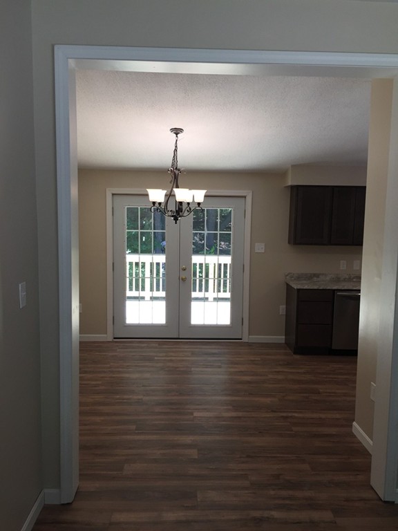 15 Barre Road Templeton, MA 01468 - Photo 5 of 14 a view of livingroom with kitchen island wooden floor and window