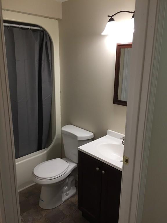 15 Barre Road Templeton, MA 01468 - Photo 7 of 14 a white toilet sitting next to a bathroom sink