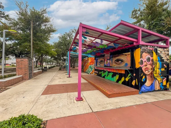a view of a street with an outdoor space