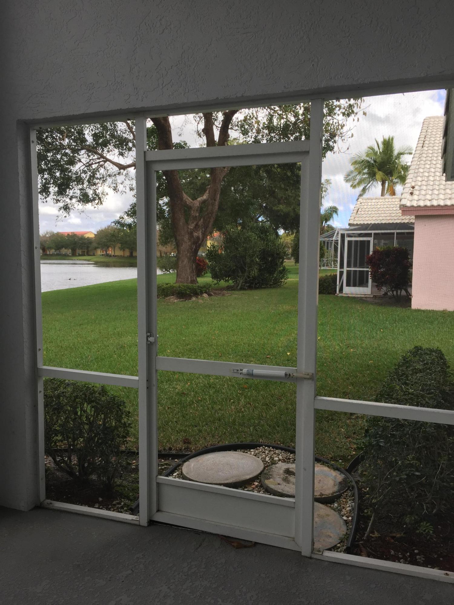 176 Cove Road Greenacres, FL 33413 - Photo 55 of 66 Back porch