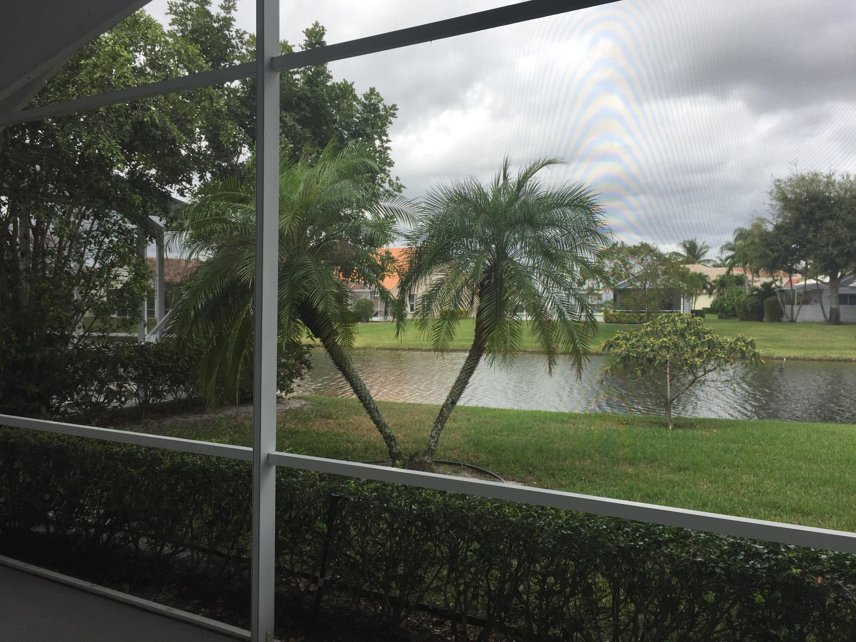 176 Cove Road Greenacres, FL 33413 - Photo 57 of 66 Back porch