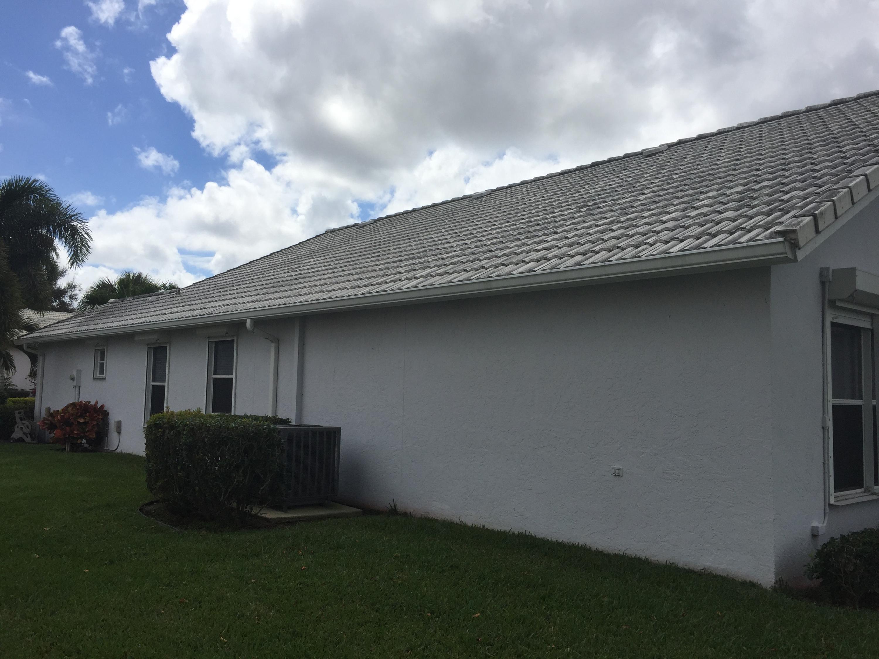 176 Cove Road Greenacres, FL 33413 - Photo 58 of 66 East side of house facing front