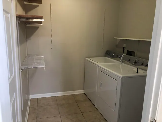 a bathroom with a sink toilet and vanity