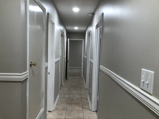 a view of hallway with shower