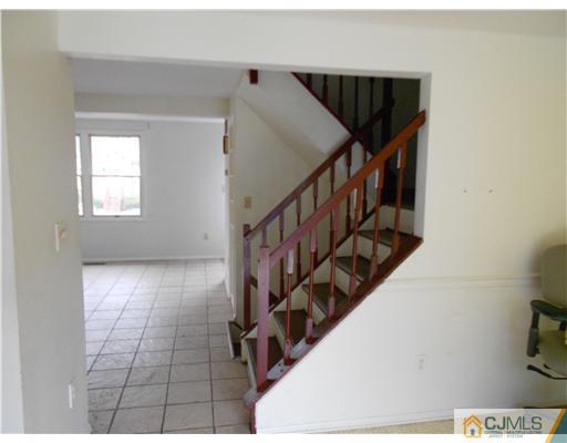 675 Bound Brook Road, Unit 10 Dunellen, NJ 08812 - Photo 4 of 7 a view of entryway and hall