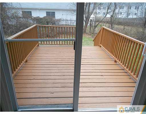 675 Bound Brook Road, Unit 10 Dunellen, NJ 08812 - Photo 6 of 7 a view of balcony with wooden floor