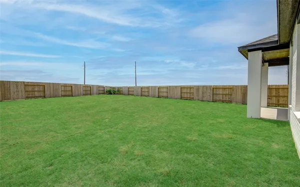 a view of a backyard with a small cabin