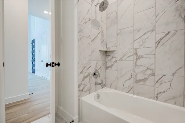 a bathroom with a bathtub
