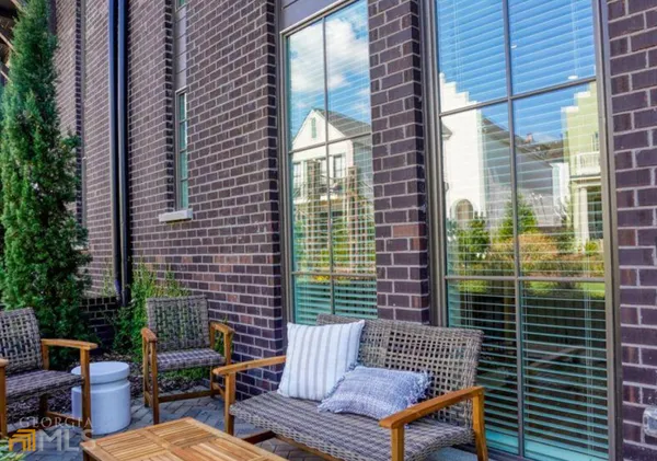 a view of a outdoor seating area with furniture