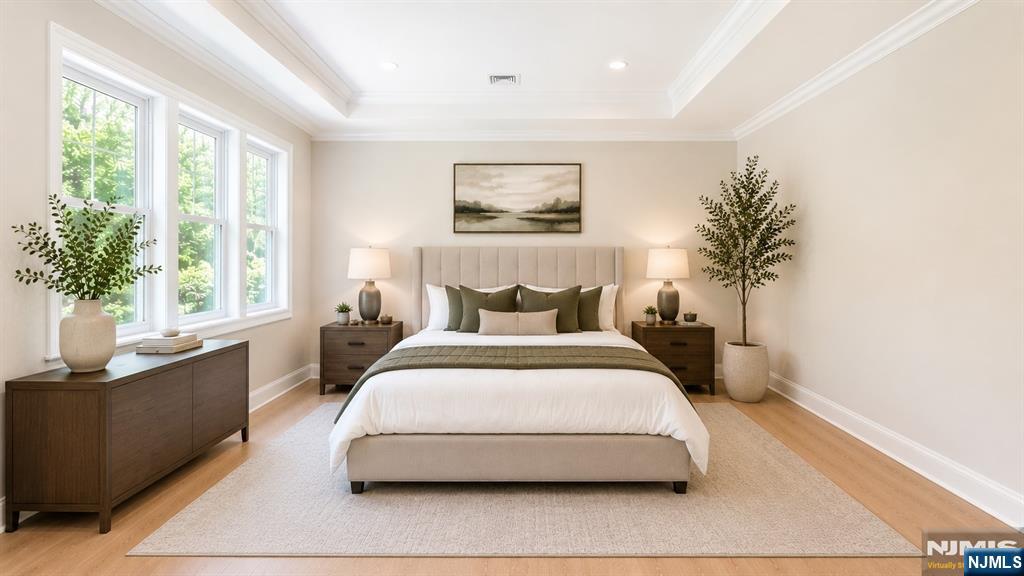 405 Valley Road River Edge, NJ 07661 - Photo 13 of 20 a bedroom with a large bed and a window