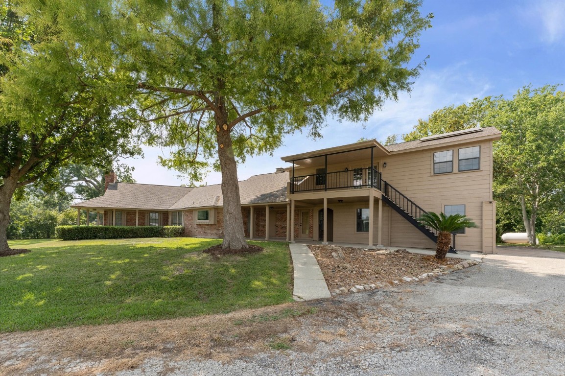 a view of a yard in front of a house