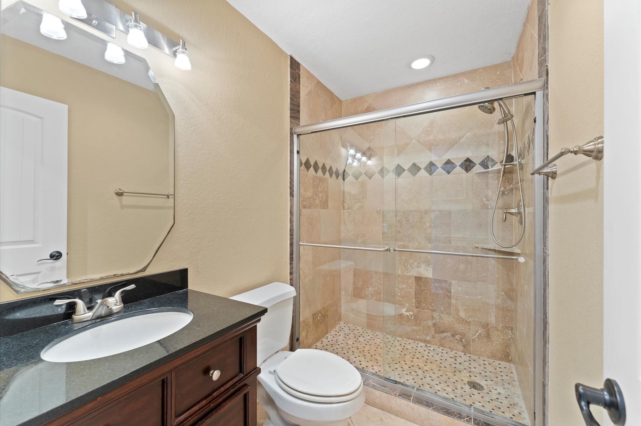 1101 Baker Road Rosenberg, TX 77471 - Photo 17 of 50 a bathroom with a sink a toilet and shower