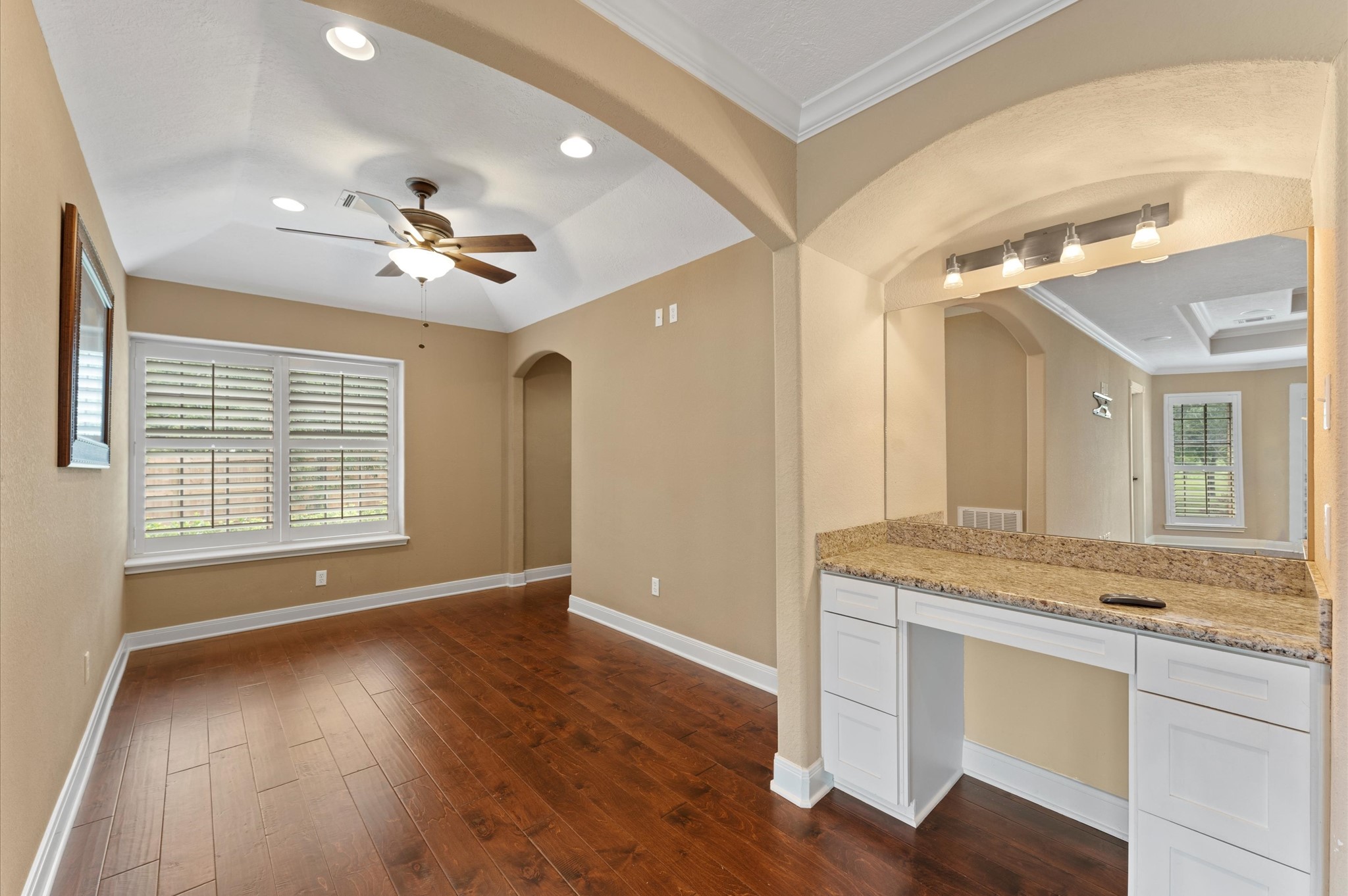 1101 Baker Road Rosenberg, TX 77471 - Photo 23 of 50 a view of an empty room with a kitchen and a window