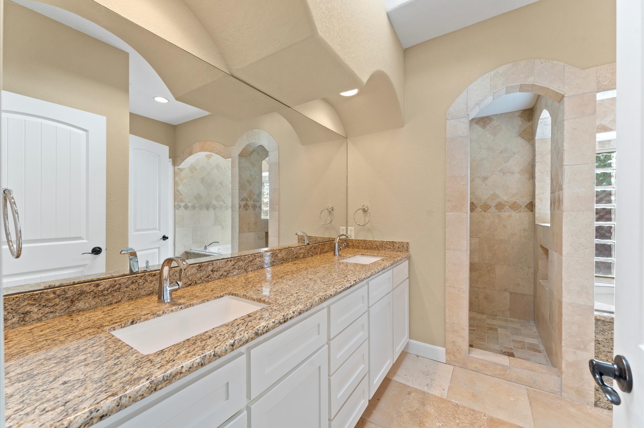 1101 Baker Road Rosenberg, TX 77471 - Photo 25 of 50 a bathroom with a granite countertop sink and a mirror