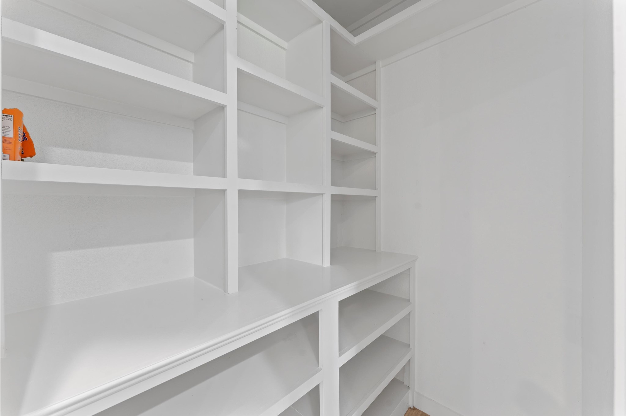 1101 Baker Road Rosenberg, TX 77471 - Photo 29 of 50 a view of walk in closet with empty racks