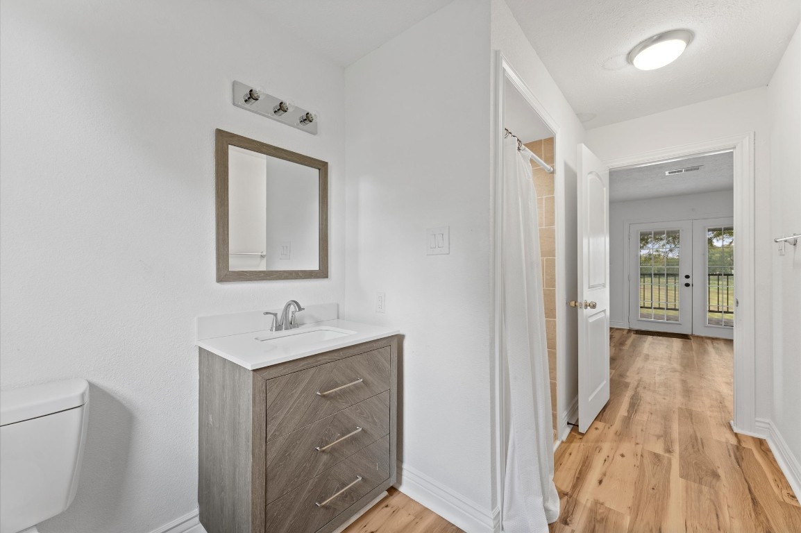 1101 Baker Road Rosenberg, TX 77471 - Photo 35 of 50 a bathroom with a sink and a mirror
