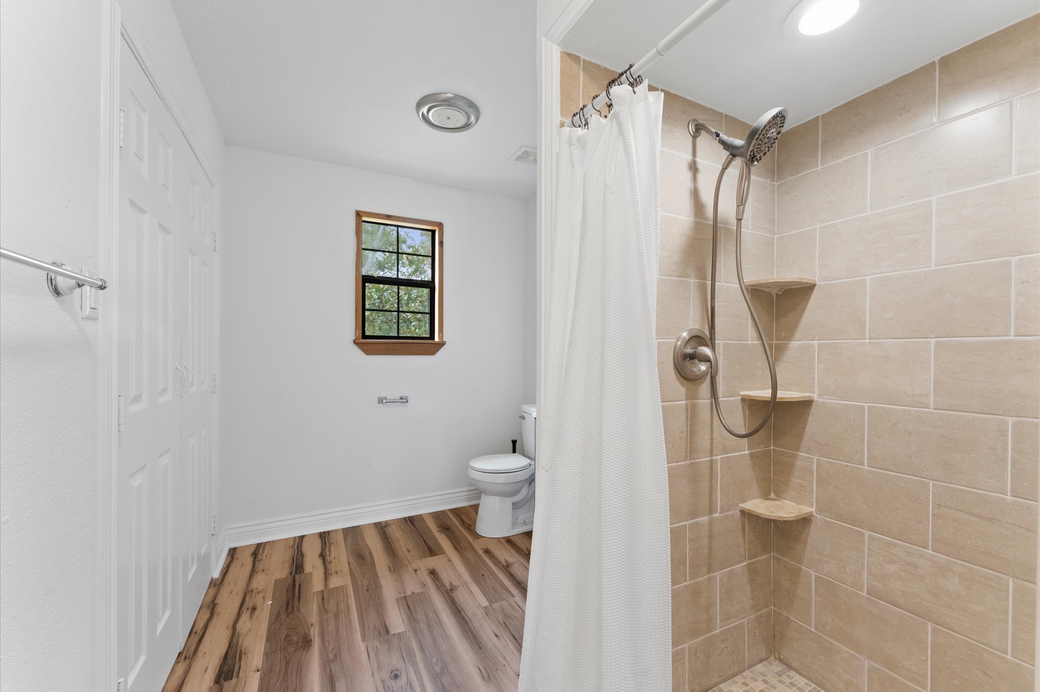 1101 Baker Road Rosenberg, TX 77471 - Photo 36 of 50 a bathroom with a toilet and a shower