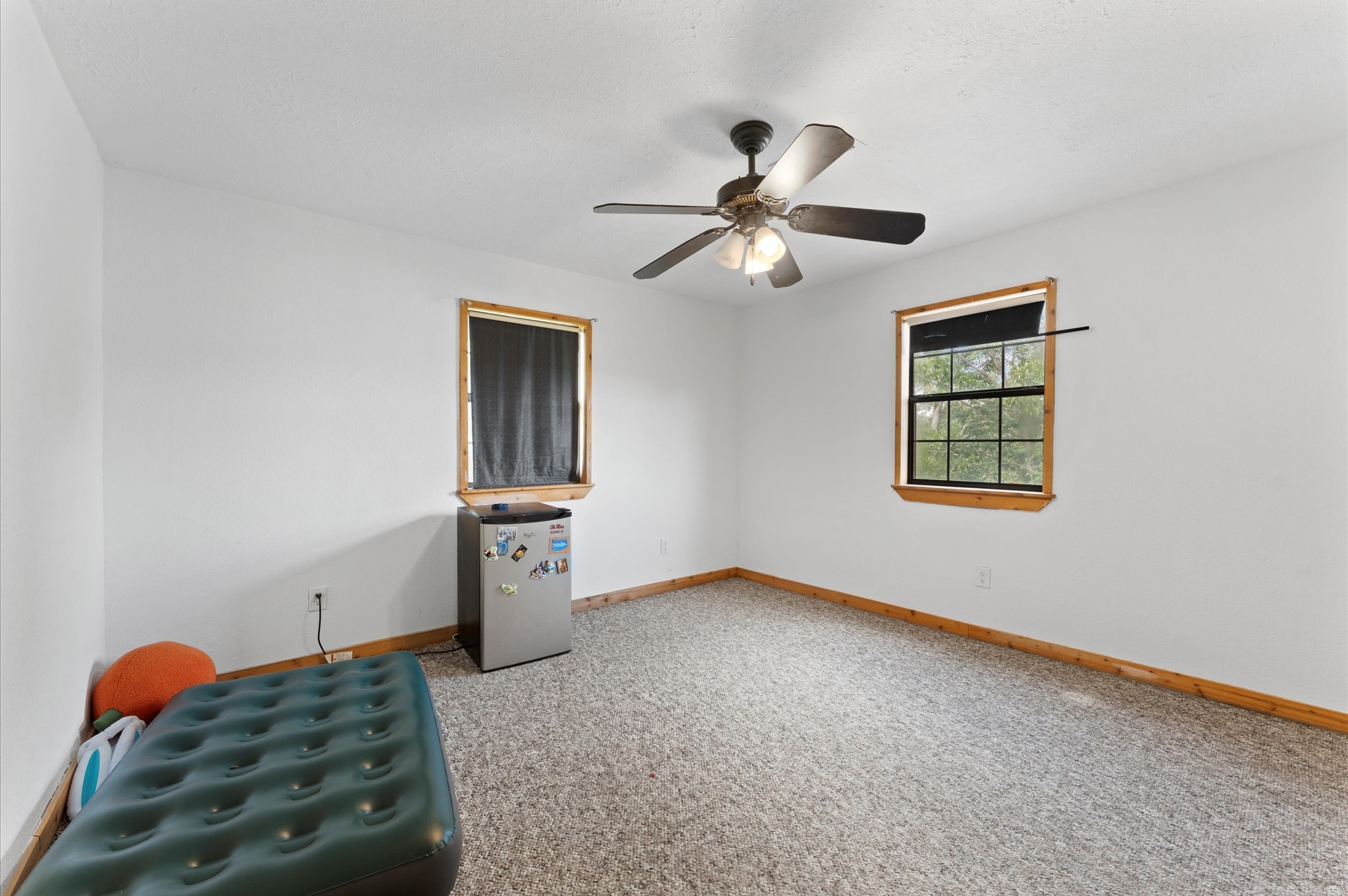1101 Baker Road Rosenberg, TX 77471 - Photo 37 of 50 a bedroom with a bed and a chandelier