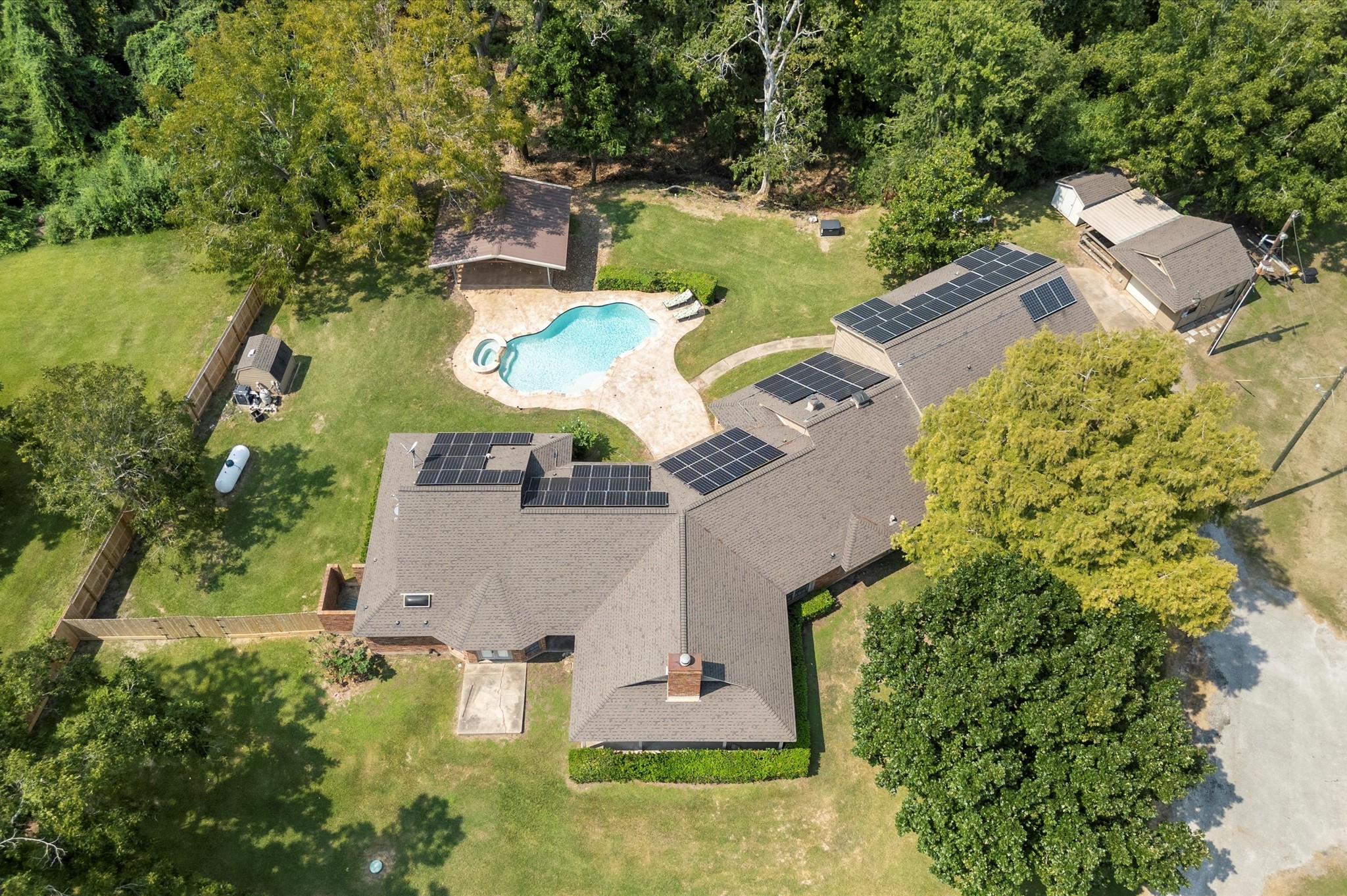 1101 Baker Road Rosenberg, TX 77471 - Photo 48 of 50 an aerial view of a house with swimming pool and ocean view