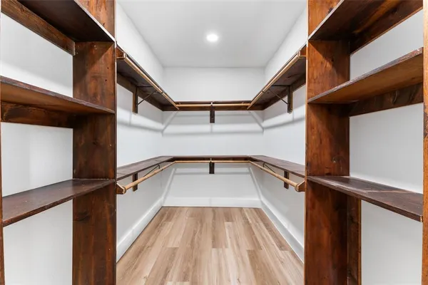 a view of balcony with wooden floor