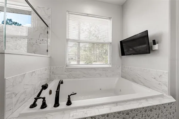 a view of a bathroom from the hallway