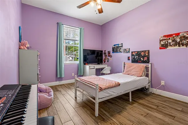 a bathroom with a double vanity sink toilet mirror and shower