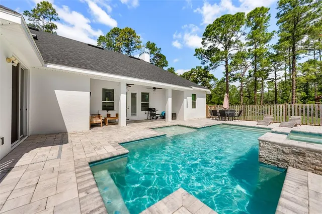 a view of a park with large trees