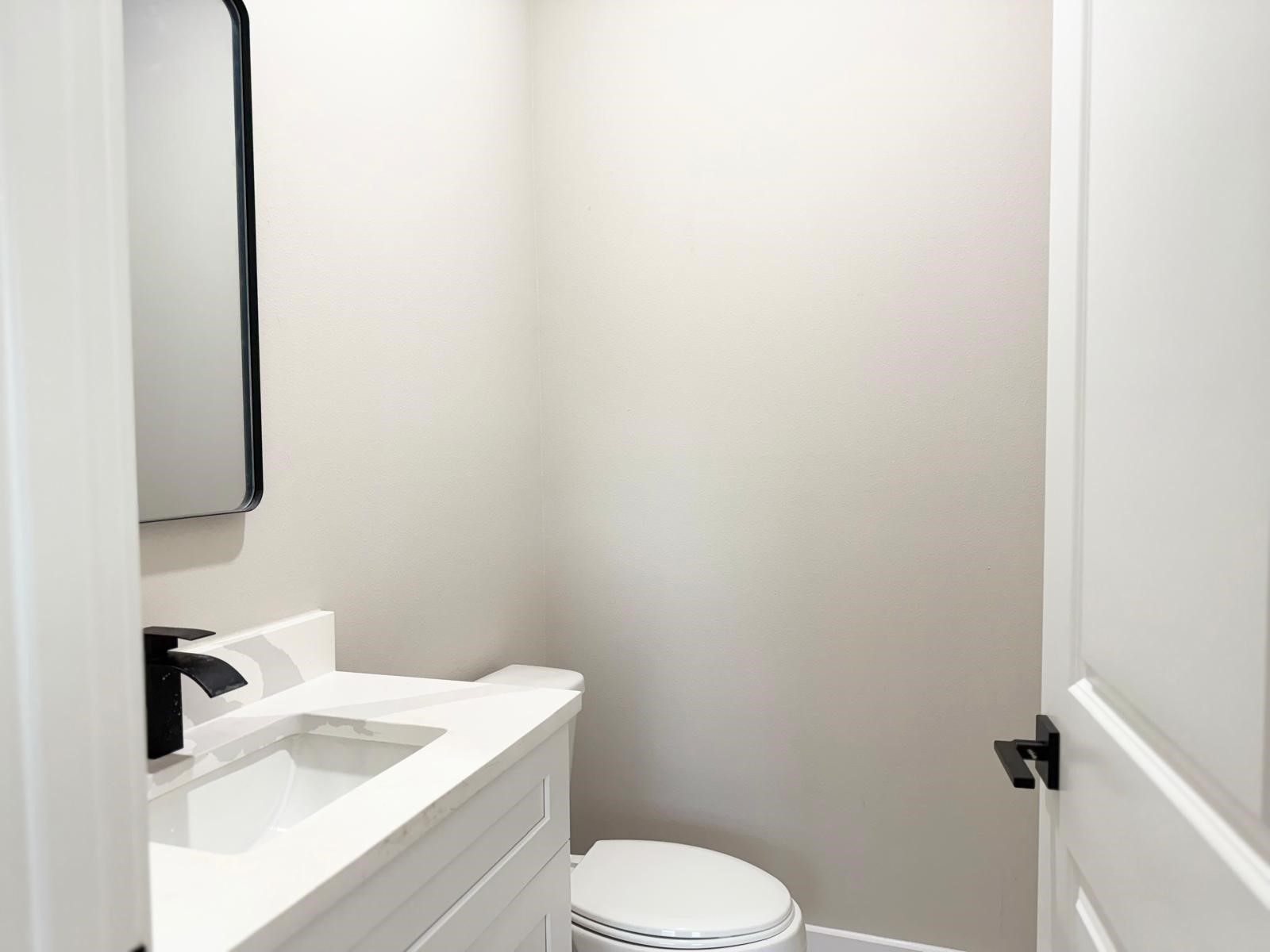 2518 Liguria Ln Spring Spring, TX 77388 - Photo 10 of 36 Convenient half bath with modern fixtures, perfect for guests.