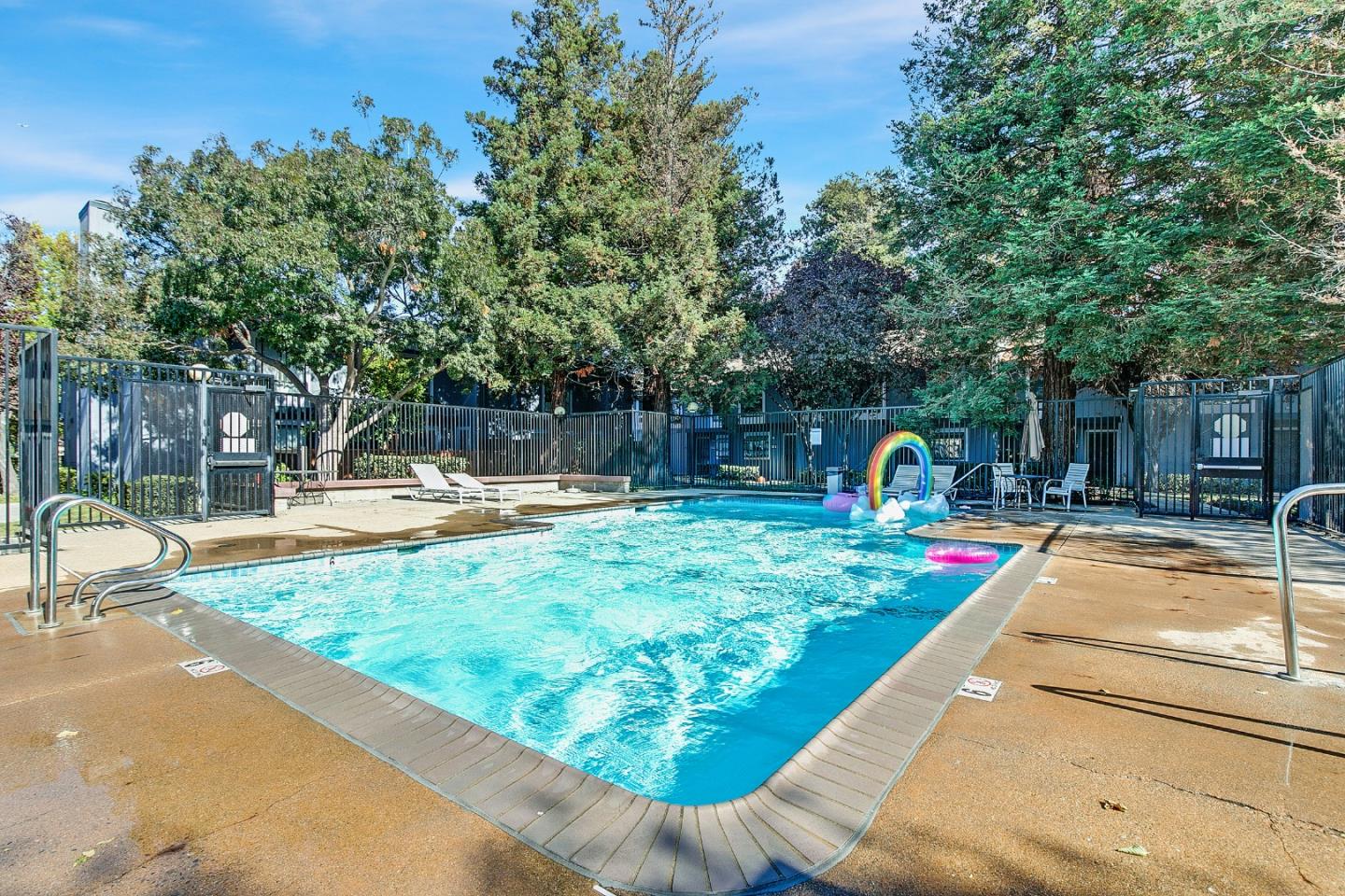 36913 Newark Boulevard, Unit A Newark, CA 94560 - Photo 19 of 20 a view of a swimming pool with a patio