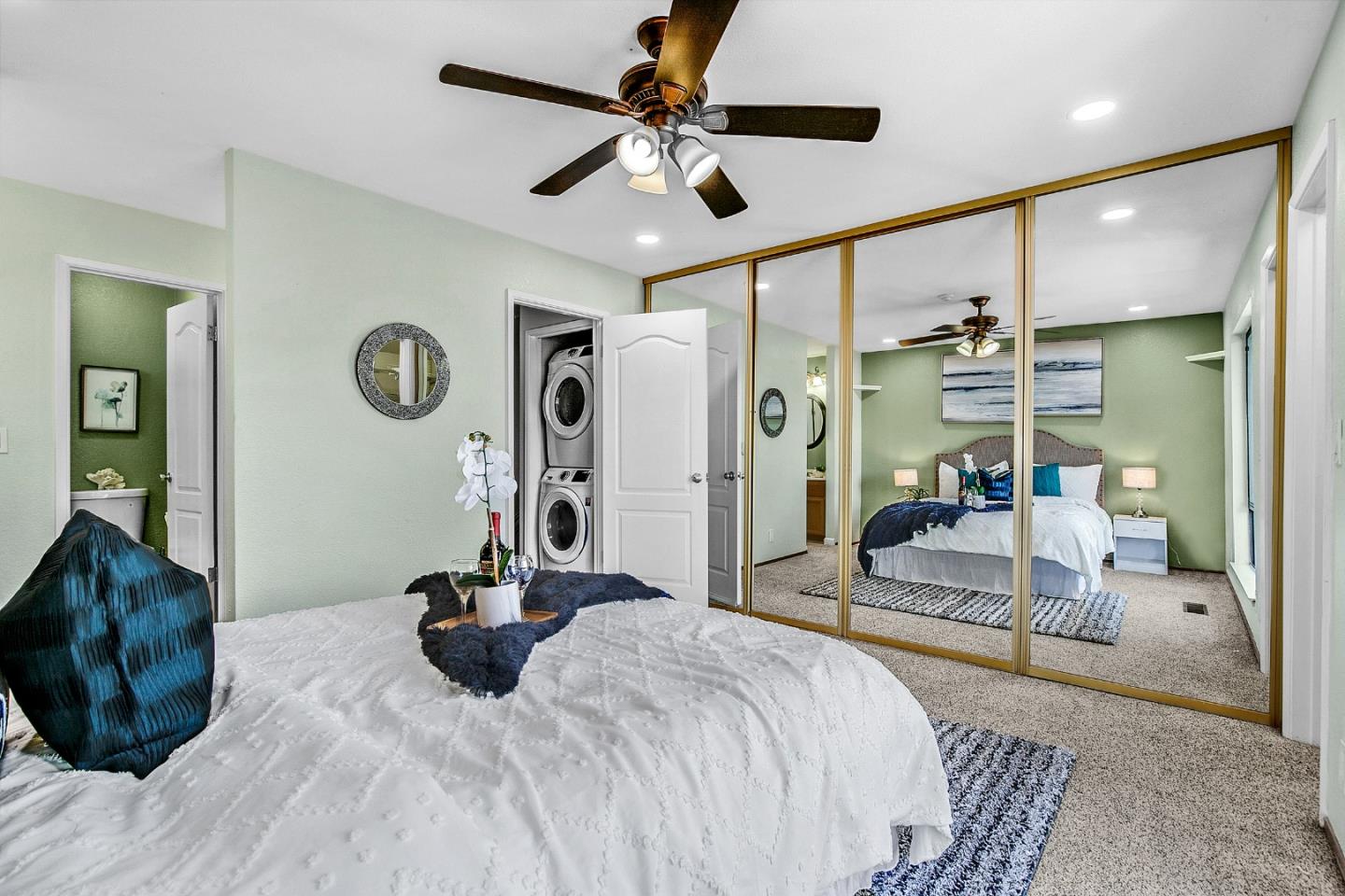 36913 Newark Boulevard, Unit A Newark, CA 94560 - Photo 10 of 20 a bedroom with a bed mirror and a desk