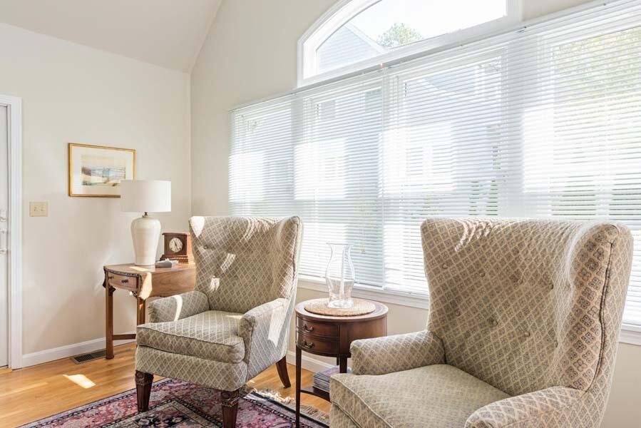 6 Wading Place Road Mashpee, MA 02649 - Photo 15 of 35 a living room with furniture and a large window