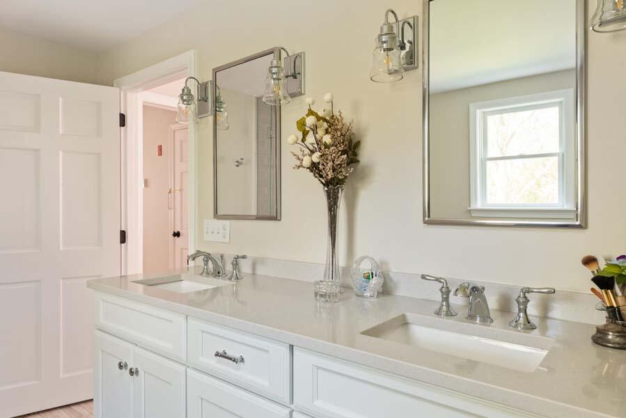 6 Wading Place Road Mashpee, MA 02649 - Photo 19 of 35 a bathroom with cabinets and window