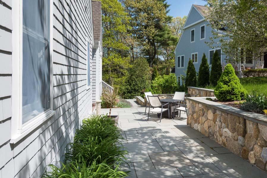 6 Wading Place Road Mashpee, MA 02649 - Photo 26 of 35 a view of a patio with table and chairs and potted plants