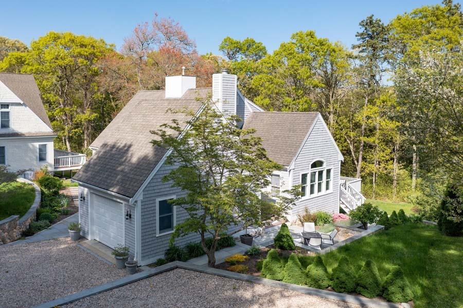 6 Wading Place Road Mashpee, MA 02649 - Photo 33 of 35 front view of a house with a yard